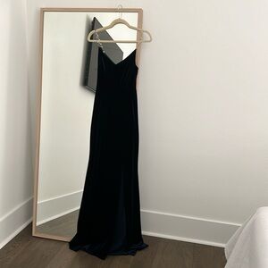 B. Darlin navy blue velvet gown with pearl straps